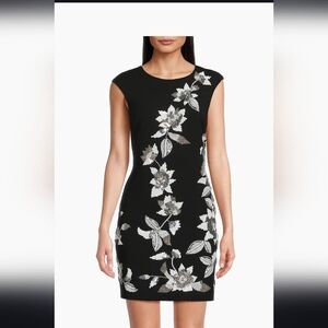 Elegant Black Mini Dress with Silver Floral Design